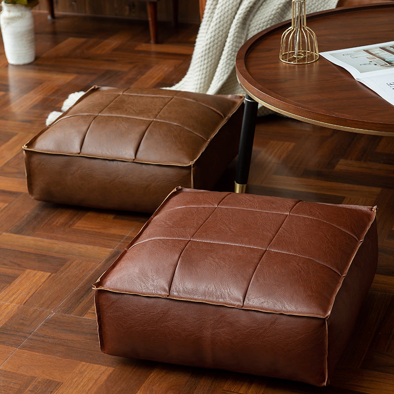 Marokkanisches Kunstleder-Pouf mit Muster, Seitenansicht – Pelanva